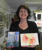 Jana with her paintings